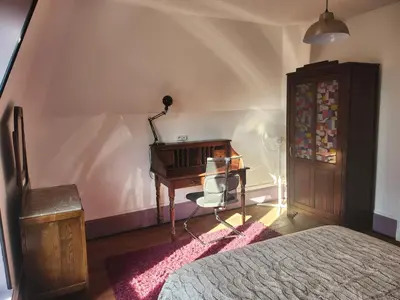 Un ou plusieurs lits dans un hébergement de l'établissement Le logis de Tania - 2 chambres - Rue calme dans centre ville