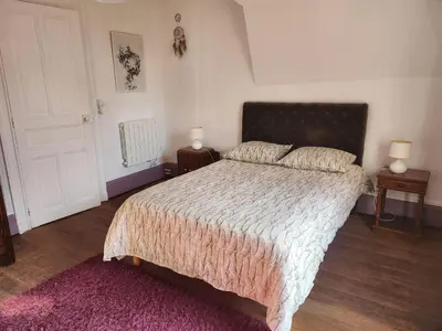 Un ou plusieurs lits dans un hébergement de l'établissement Le logis de Tania - 2 chambres - Rue calme dans centre ville