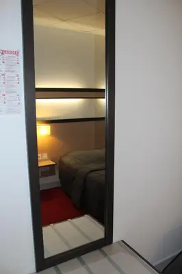 Un ou plusieurs lits dans un hébergement de l'établissement Hôtel de la Meuse