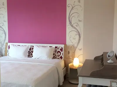 Un ou plusieurs lits dans un hébergement de l'établissement VILLA 87 - AY CHAMPAGNE