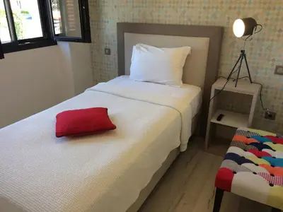 Un ou plusieurs lits dans un hébergement de l'établissement VILLA 87 - AY CHAMPAGNE