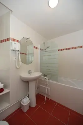 Salle de bains dans l'établissement La Corrérie
