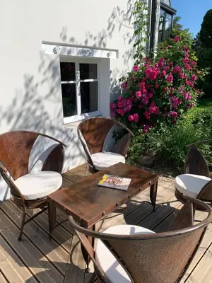 Coin salon dans l'établissement Maison d'Hôtes Joussaume Latour