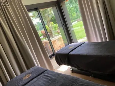 Un ou plusieurs lits dans un hébergement de l'établissement Le Moulin de l'Ortille & SPA