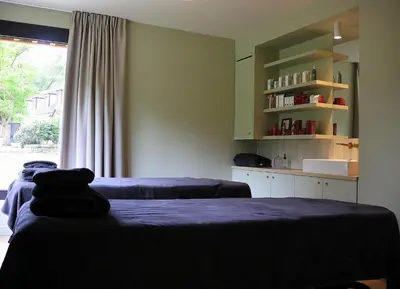 Un ou plusieurs lits dans un hébergement de l'établissement Le Moulin de l'Ortille & SPA