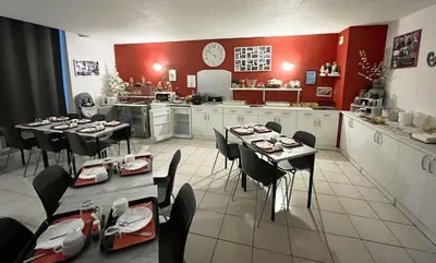 Cuisine ou kitchenette dans l'établissement Résidence Vacancéole - Les Demeures Champenoises