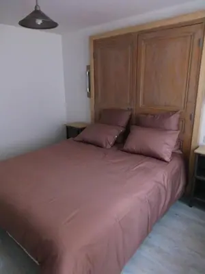 Un ou plusieurs lits dans un hébergement de l'établissement Cottage AU TERMINUS