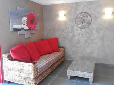 Coin salon dans l'établissement Hôtel L'Argonn' Auberge