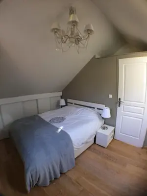Un ou plusieurs lits dans un hébergement de l'établissement Le Gîte du Château