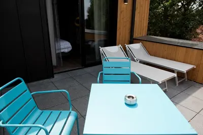 Coin salon dans l'établissement Armes de Champagne Hôtel & Spa