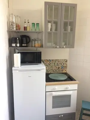 Cuisine ou kitchenette dans l'établissement Le classique champenois, centre ville, proche cathédrale