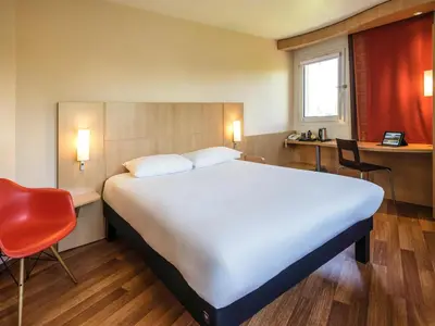 Un ou plusieurs lits dans un hébergement de l'établissement Ibis Château-Thierry