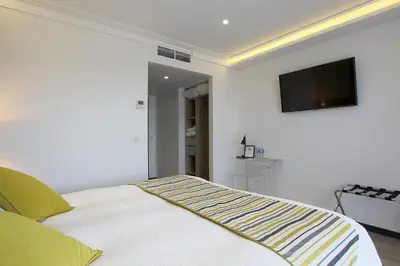 Télévision ou salle de divertissement dans l'établissement Le Clos du Moulin