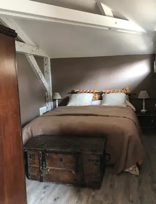 Un ou plusieurs lits dans un hébergement de l'établissement Le Clos des Moulins 2 rue des cotes de l'Héry