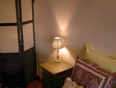Un ou plusieurs lits dans un hébergement de l'établissement La Grange aux Loirs B&B