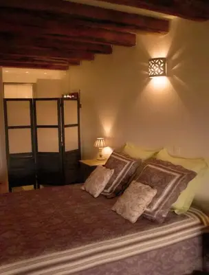 Un ou plusieurs lits dans un hébergement de l'établissement La Grange aux Loirs B&B