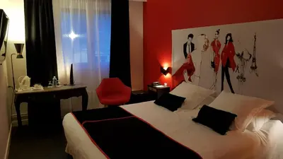 Un ou plusieurs lits dans un hébergement de l'établissement Hotel de Champagne