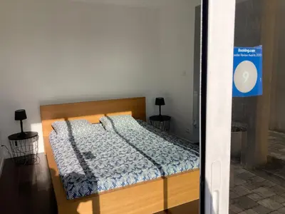 Un ou plusieurs lits dans un hébergement de l'établissement Chambre Quadruple Avec 4 Couchages - Proche Disneyland Paris