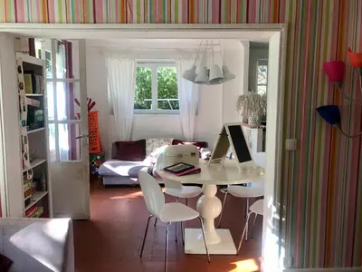 Coin salon dans l'établissement Adorable et amusante maison de campagne