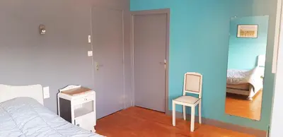 Un ou plusieurs lits dans un hébergement de l'établissement La Dimanche
