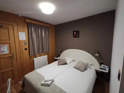 Un ou plusieurs lits dans un hébergement de l'établissement Auberge Saint-Jean