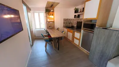 Cuisine ou kitchenette dans l'établissement La Maison des Prés Disney Paris
