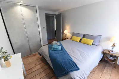 Un ou plusieurs lits dans un hébergement de l'établissement Terrasse 86 - Terrasse & Climatisation - 4-6 personnes - BnB Epernay