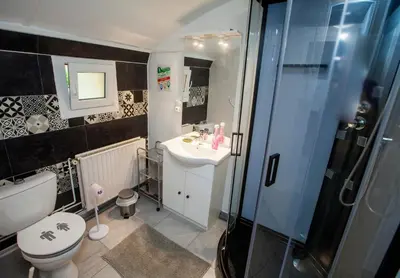 Salle de bains dans l'établissement GÎTE Le Moulineau