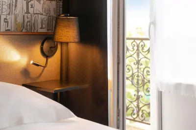 Un ou plusieurs lits dans un hébergement de l'établissement Hôtel Bristol Reims