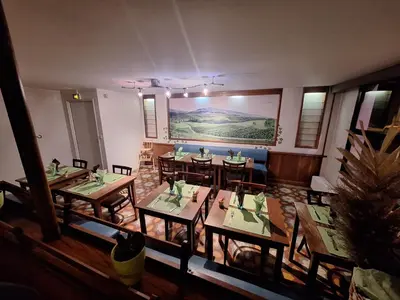 Coin salon dans l'établissement Hotel Au Bon Sejour
