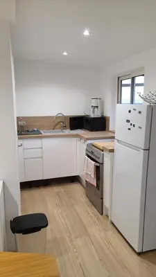 Cuisine ou kitchenette dans l'établissement Petit séjour en chalet