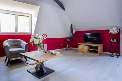 Télévision ou salle de divertissement dans l'établissement le saint Hubert