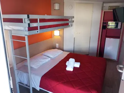 Un ou plusieurs lits dans un hébergement de l'établissement Premiere Classe Soissons