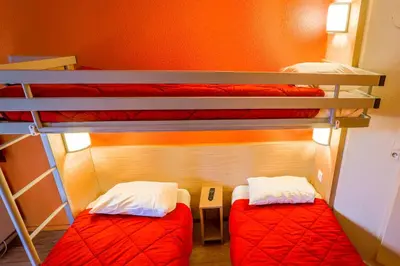 Un ou plusieurs lits dans un hébergement de l'établissement Premiere Classe St Quentin