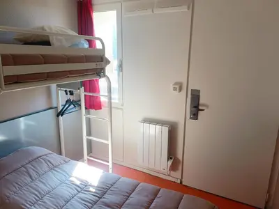 Un ou plusieurs lits dans un hébergement de l'établissement FASTHOTEL Reims Est - Taissy