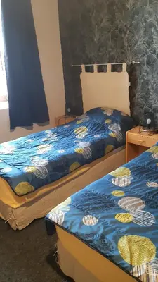 Un ou plusieurs lits dans un hébergement de l'établissement gîte les bois georges