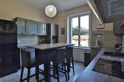 Cuisine ou kitchenette dans l'établissement Ancienne Gare du Val des Bois