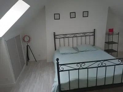 Un ou plusieurs lits dans un hébergement de l'établissement duplex agréable et calme