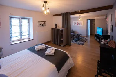 Un ou plusieurs lits dans un hébergement de l'établissement Ô Spa Champenois