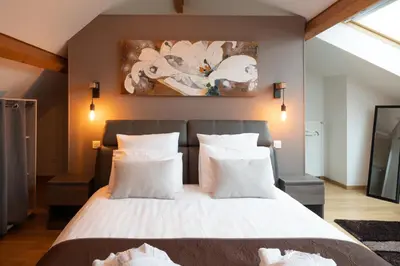 Un ou plusieurs lits dans un hébergement de l'établissement Ô Spa Champenois