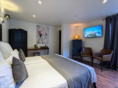 Un ou plusieurs lits dans un hébergement de l'établissement Chambres d'Hôtes La Filature