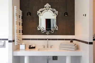 Salle de bains dans l'établissement Continental Hotel