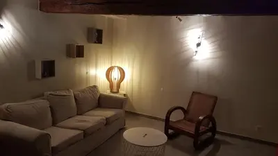 Coin salon dans l'établissement Appartement au calme