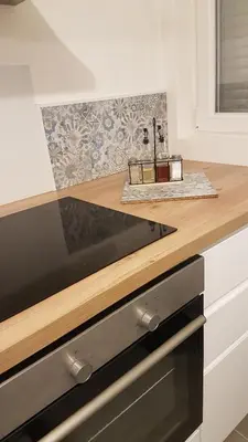 Cuisine ou kitchenette dans l'établissement Appartement au calme