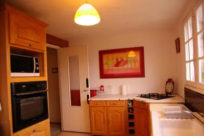 Cuisine ou kitchenette dans l'établissement L Ancienne Ferme 17 grand rue