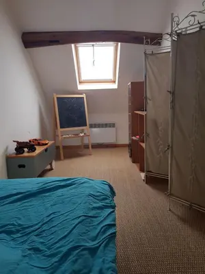 Un ou plusieurs lits dans un hébergement de l'établissement Cozy cottage & ideal closed garden