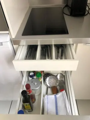 Cuisine ou kitchenette dans l'établissement LE NID DES HALLES, au cœur du Boulingrin