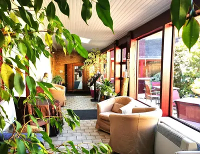 Coin salon dans l'établissement Logis Hôtel-Restaurant La Sapinière