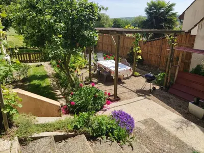Jardin de l'établissement Chambre en rez de jardin