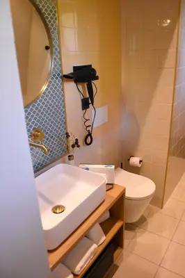 Salle de bains dans l'établissement DOMITYS - Le château de la Pilule